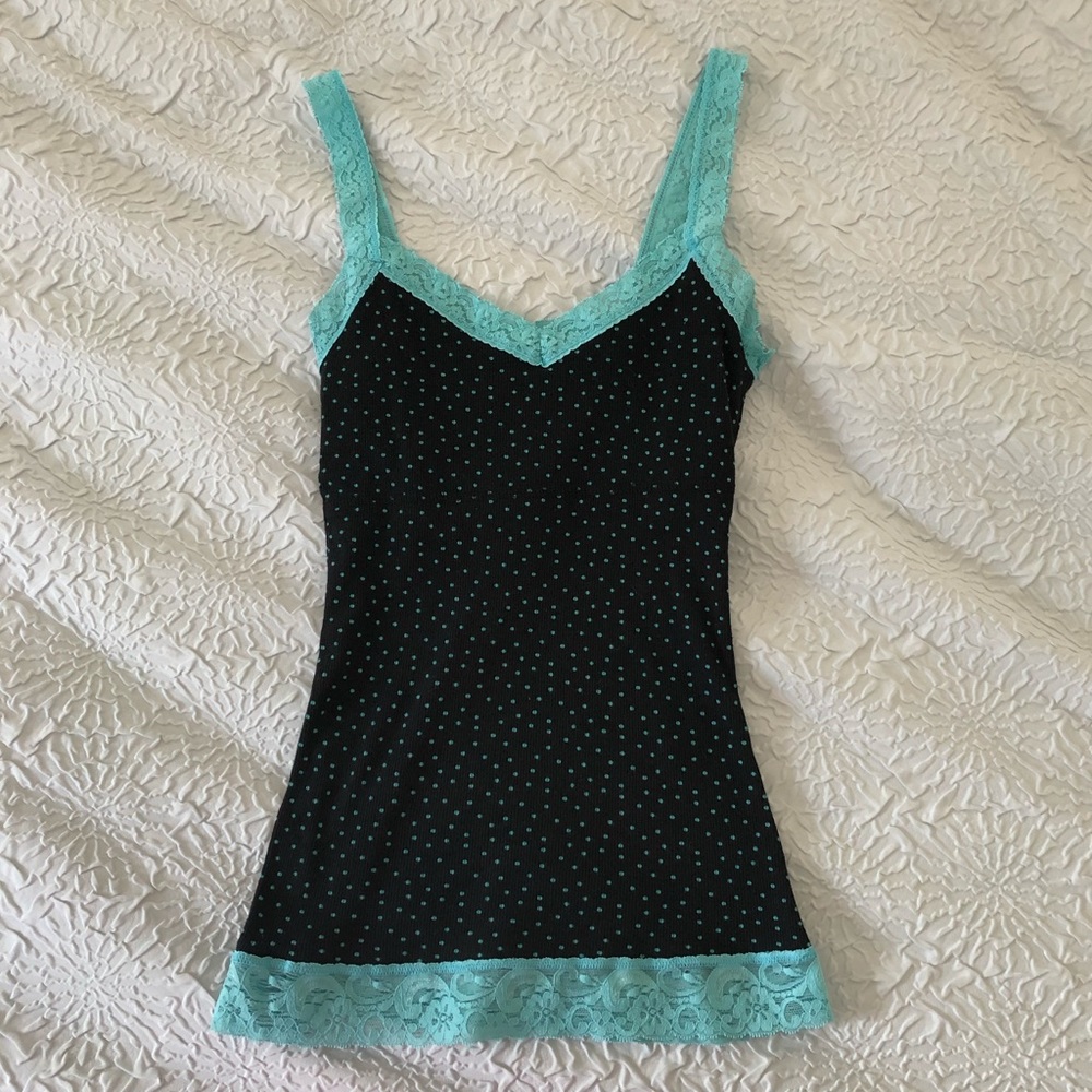 Turquoise and black tank top.